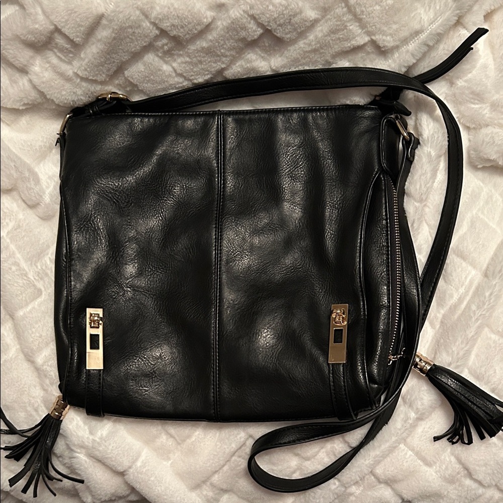 MMS Design Studio Black Crossbody Bag with Gold Accents.